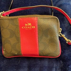 Coach pink and dark brown Wristlet